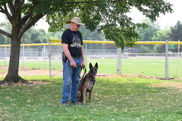 Chris Campbell Schutzhund Seminar 2021 — a young Belgian Malinois receiving foundation training on the table — photo 15