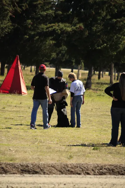 October 5–6, 2013 RVSC Affiliation Trial on October 5–6, 2013 — a working dog and handler completing a formal trial exercise — photo 02