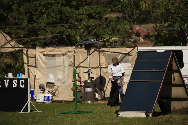 October 5–6, 2013 RVSC Affiliation Trial on October 5–6, 2013 — a working dog engaging the helper during the protection phase — photo 27