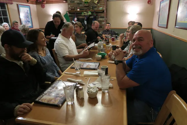2016 Club Christmas Party on December 17, 2016 — members enjoying dinner and conversation at the club party — photo 06