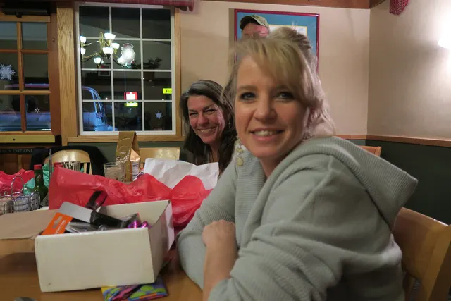 2016 Club Christmas Party on December 17, 2016 — a club member smiling during the Christmas gathering — photo 14