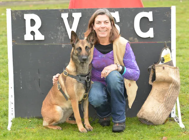 March 22, 2014 RVSC Club Training — a working dog engaging a helper during controlled protection training — photo 04