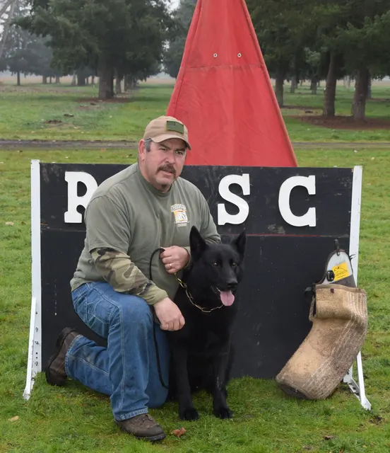 March 22, 2014 RVSC Club Training — a working dog training near a Schutzhund blind — photo 03