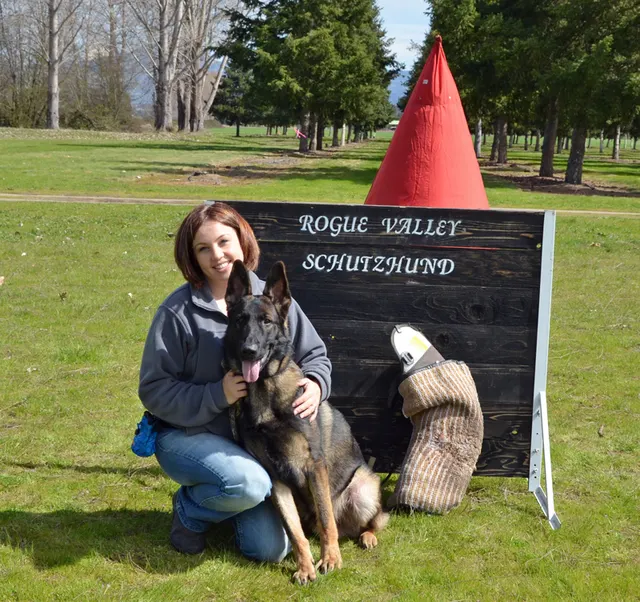 March 24, 2013 RVSC Club Training on March 24, 2013 — a handler and working dog photographed together at the club field — photo 03