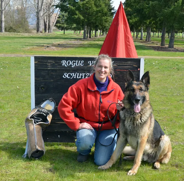March 24, 2013 RVSC Club Training on March 24, 2013 — a club member posing with a German Shepherd during the training day — photo 06