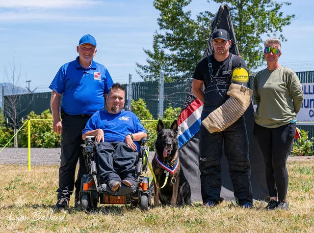 2025 RVSC IGP Trial — RVSC trial participants and working dog gathered for a group photo — photo 03